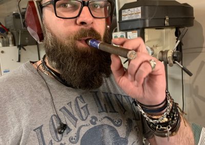 The man likes his Cigars!!  (my shop does smell good when he is around)